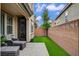 Cozy backyard patio featuring comfortable seating and an artificial lawn at 1908 Morro Vista Dr, Las Vegas, NV 89135
