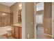 Cozy bathroom featuring a shower and tub combo plus a lovely vanity area at 1908 Morro Vista Dr, Las Vegas, NV 89135