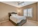 Comfortable bedroom with neutral walls, carpet, and ceiling fan provides a relaxing atmosphere at 1908 Morro Vista Dr, Las Vegas, NV 89135