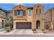 Charming two-story home features a well-manicured front yard and inviting curb appeal at 1908 Morro Vista Dr, Las Vegas, NV 89135