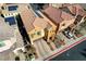 Aerial view of a home featuring a terracotta-tiled roof, solar panels, and a well-kept yard at 1908 Morro Vista Dr, Las Vegas, NV 89135