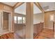 Open second floor hallway with wood railing, offering views of the neighborhood at 1908 Morro Vista Dr, Las Vegas, NV 89135