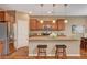 Kitchen featuring an island with granite countertops, pendant lighting, and stainless appliances at 1908 Morro Vista Dr, Las Vegas, NV 89135