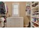 Well-organized walk-in closet featuring built-in shelves, hanging rods, and ample storage for clothes and accessories at 1908 Morro Vista Dr, Las Vegas, NV 89135