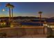 Backyard with wrought iron fencing overlooks city and mountain views at 1992 Fort Halifax St, Henderson, NV 89052