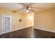 Bedroom with hard wood floors, a ceiling fan, and access to the backyard at 1992 Fort Halifax St, Henderson, NV 89052