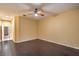 Bedroom with hard wood floors, a ceiling fan, and access to the hall at 1992 Fort Halifax St, Henderson, NV 89052