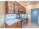 Kitchen with granite countertops and stainless steel appliances at 1992 Fort Halifax St, Henderson, NV 89052