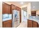 Kitchen with stainless steel refrigerator and granite countertops at 1992 Fort Halifax St, Henderson, NV 89052