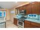 Stainless steel microwave and oven with granite countertops at 1992 Fort Halifax St, Henderson, NV 89052