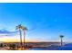 Scenic landscape featuring mountain views and palm trees, creating a serene and tropical ambiance at 1992 Fort Halifax St, Henderson, NV 89052