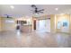 Open living space with ceiling fan and white barn doors at 1992 Fort Halifax St, Henderson, NV 89052