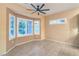 Bay window sitting area with neutral wall and floor coverings at 1992 Fort Halifax St, Henderson, NV 89052