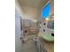 Well-maintained bathroom featuring a shower-tub combination and a modern vanity at 213 Beaver Ridge Ave, North Las Vegas, NV 89031