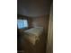 Relaxing bedroom with a large bed and soft natural light from a window at 213 Beaver Ridge Ave, North Las Vegas, NV 89031