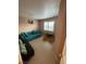 Cozy room with a comfortable couch, neutral tones, and lots of natural light at 213 Beaver Ridge Ave, North Las Vegas, NV 89031
