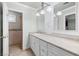 Well-lit bathroom with an expansive countertop, single sink and a separate shower at 2233 Marlboro Dr, Henderson, NV 89014