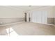 Spacious bedroom with neutral carpeting, ample closet space, and fresh paint at 2233 Marlboro Dr, Henderson, NV 89014