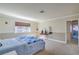 Comfortable bedroom with a large window, neutral walls, and well-maintained carpeting at 2233 Marlboro Dr, Henderson, NV 89014