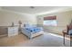 Bedroom with natural lighting, carpeted floors, and neutral walls providing a calming retreat at 2233 Marlboro Dr, Henderson, NV 89014