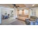 Comfortable living area offering a seamless transition to the dining room, creating an open and airy atmosphere at 2233 Marlboro Dr, Henderson, NV 89014