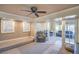 Inviting living area with a ceiling fan, carpeted floors, and French doors leading to other living spaces at 2233 Marlboro Dr, Henderson, NV 89014