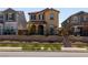 Charming two-story home featuring stucco exterior, tile roof, and landscaped front yard with wrought iron fence at 2665 Piroli St, Henderson, NV 89044