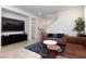 Open-concept living room featuring contemporary decor, stylish furniture, and ample space at 2665 Piroli St, Henderson, NV 89044