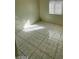 Bright bedroom featuring tile flooring and a window providing natural light at 2705 Howard Dr, Las Vegas, NV 89104