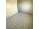 Neutrally painted bedroom featuring tile flooring at 2705 Howard Dr, Las Vegas, NV 89104