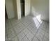 Spacious bedroom with ample closet space and neutral tile flooring at 2705 Howard Dr, Las Vegas, NV 89104