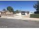 Cozy single-story home with a gravel front yard and well-maintained driveway and walkway at 2705 Howard Dr, Las Vegas, NV 89104