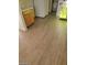Updated vinyl floors complement the cabinets in the kitchen space at 2705 Howard Dr, Las Vegas, NV 89104