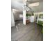 This kitchen has open space with nice flooring, overhead lighting, and a refrigerator at 2705 Howard Dr, Las Vegas, NV 89104
