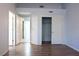 Bedroom featuring wood-look floors and ample closet space at 2841 Bluff Point Dr, Las Vegas, NV 89134