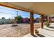 A well-maintained backyard featuring an outdoor patio, storage sheds, and open space at 3212 Osage Ave, Las Vegas, NV 89101
