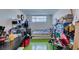 Bright bedroom with green floors and a window offering natural light at 3212 Osage Ave, Las Vegas, NV 89101