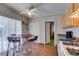 Charming kitchen boasts tile floors, wood cabinets and a gas stove, perfect for home cooking at 3212 Osage Ave, Las Vegas, NV 89101