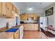 A bright kitchen with essential appliances and an eat-in area, perfect for casual dining at 3212 Osage Ave, Las Vegas, NV 89101
