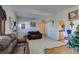 Comfortable living room area with tile flooring and neutral wall colors at 3212 Osage Ave, Las Vegas, NV 89101