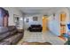 Comfortable living room area with tile flooring and neutral wall colors at 3212 Osage Ave, Las Vegas, NV 89101