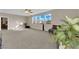 Spacious bonus room featuring large windows and a comfortable seating area at 3213 Salutare Ct, North Las Vegas, NV 89031