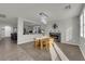 Bright dining area featuring modern lighting, neutral paint, and a cozy fireplace at 3213 Salutare Ct, North Las Vegas, NV 89031