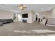 Large living room with carpet, recessed lights, and a sectional sofa at 3213 Salutare Ct, North Las Vegas, NV 89031