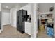 View of the pantry and refrigerator located next to the kitchen at 3213 Salutare Ct, North Las Vegas, NV 89031