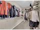Spacious walk-in closet with carpet and shelving for optimal storage at 3213 Salutare Ct, North Las Vegas, NV 89031