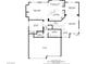 A floorplan view of the first floor showing the layout of the kitchen, living room, office and garage at 3504 Frigatebird Ln, North Las Vegas, NV 89084