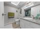 Bathroom featuring modern fixtures, granite counters, and decorative mermaid accents at 3630 Mckinley Ave, Las Vegas, NV 89121
