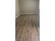Empty bedroom with laminate wood flooring at 3630 Mckinley Ave, Las Vegas, NV 89121