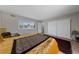 Bedroom with a window for natural light, big closet and laminate wood flooring throughout at 3630 Mckinley Ave, Las Vegas, NV 89121